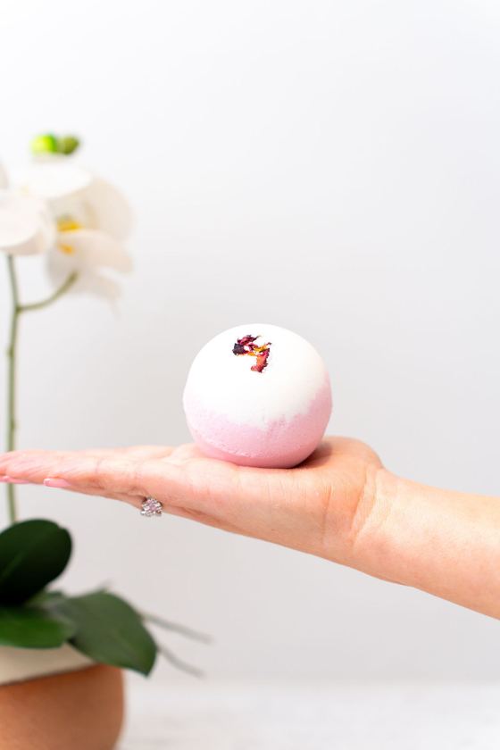 Pink bath bomb with dried petals